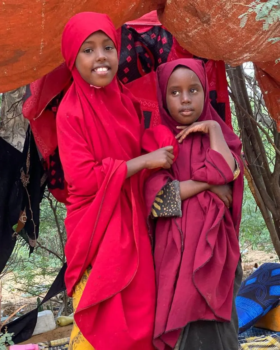 Two sisters outside their home in Mogadishu